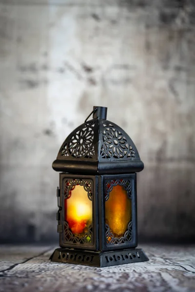 Ramadan lantern  lighten up in a vintage mood or environment .