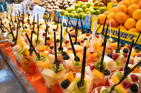 Sliced fresh fruit cup as a fast snack at the Market