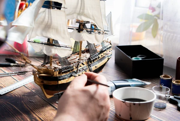 Model Ship Building handcraft on table with different materials