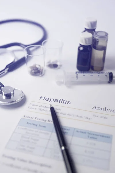 Hepatitis Labor test Paper or sheet written on it Hepatitis - analysis or medical test result concept.