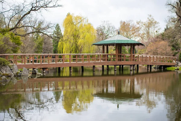 Poland, Wroclaw - April 2022. Japanese Garden in Wroclaw, traditional pergola and bridge. — Stock Photo, Image