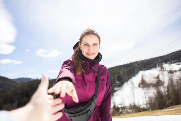 Hiker woman giving a helping hand, Hands reaching out to help each other