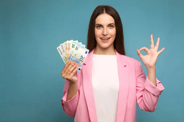 Happy Young Woman Holding Euro Bills Doing Sign Fingers High — Foto de Stock