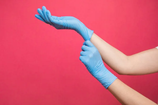 Two Hands Woman Wearing Nitrile Gloves Pink Background High Quality — 스톡 사진