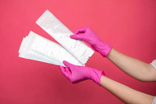 Hand Holding Sterilization Envelopes Manicure Gloves High Quality Photo — 스톡 사진