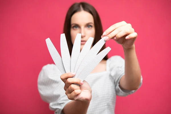 Picture Young Girl Holding Nail Files Choosing One Them High — Stock fotografie