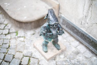 Poland, Wroclaw - April 2022. Dwarf, gnome, famous small statues in Wroclaw. High quality photo