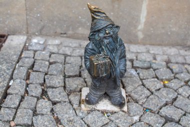 Poland, Wroclaw - April 2022. Dwarf, gnome, famous small statues in Wroclaw. High quality photo