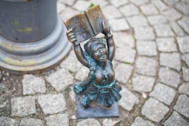 Poland, Wroclaw - April 2022. Dwarf, gnome, famous small statues in Wroclaw. High quality photo