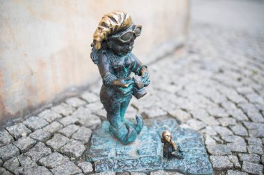 Poland, Wroclaw - April 2022. Dwarf, gnome, famous small statues in Wroclaw. High quality photo