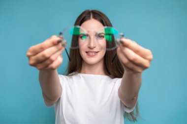 Beautiful smiling woman wearing glasses. High quality photo