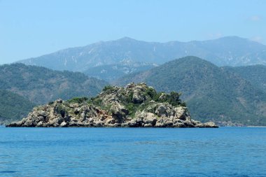 Desert island in the middle of the sea