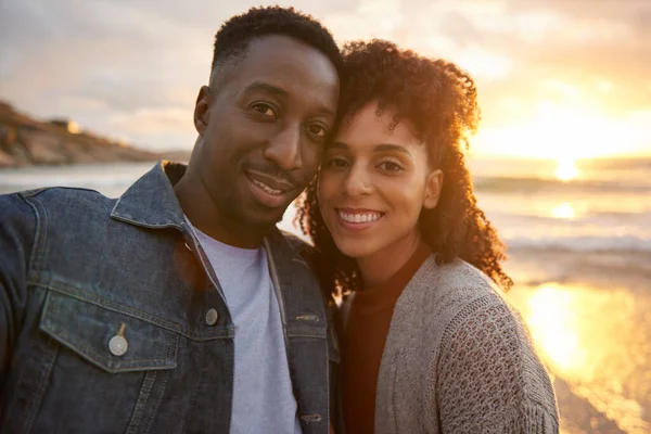 Affectionate Young Multiethnic Couple Smiling Taking Selfie While Standing Cheek — стоковое фото