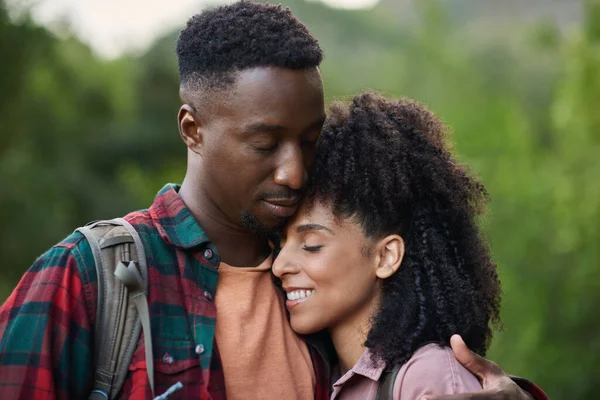 Loving Young Multiethnic Couple Standing Arm Arm Eyes Closed Trail — Stockfoto