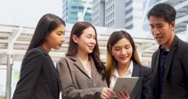 Business Partner using digital tablet online meeting team Partnership businessman, businesswoman talking together. Diversity Asian Business Partner online meeting trust teamwork. Asian Business team