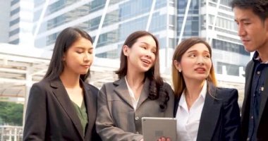 Business Partner using digital tablet online meeting team Partnership businessman, businesswoman talking together. Diversity Asian Business Partner online meeting trust teamwork. Asian Business team