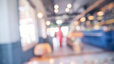 Marketin arka planı bulanık. Bulanık arka plan alışveriş merkezinin ışık saçan mağazası. Görüntü Kongresi salonu merkezi seyircisi ürünleri raf ürünlerini sunar