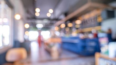 Marketin arka planı bulanık. Bulanık arka plan alışveriş merkezinin ışık saçan mağazası. Görüntü Kongresi salonu merkezi seyircisi ürünleri raf ürünlerini sunar