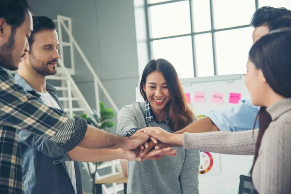 Diversity volunteer Teamwork friendship holding hands together. Multiethnic Business people team Solidarity charity. Team partner people teamwork holding hands together power of tag team partnership.