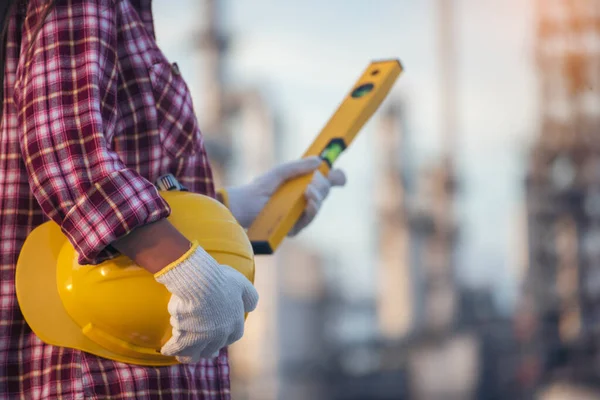 Woman construction engineer wear safety white hard hat at construction site industry worker. Female engineer worker civil engineering with hard hat safety helmet. Woman construction Engineer concept