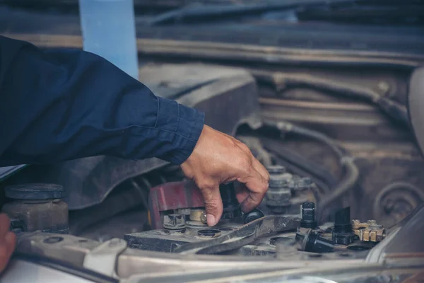 Mechanic car service auto garage in automotive mobile center. Technician workshop repair engine motor vehicles service mechanical engineering business. Automobile mechanic hands car repairs technic