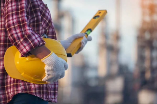 Woman construction engineer wear safety white hard hat at construction site industry worker. Female engineer worker civil engineering with hard hat safety helmet. Woman construction Engineer concept