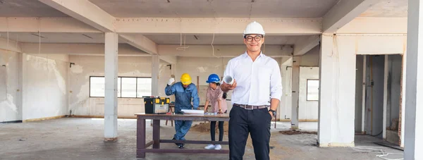 Banner Civil construction engineer team meeting on construction site with partner teamwork trust team consult together. Panorama image engineer team discuss wear hard hat construction engineer concept