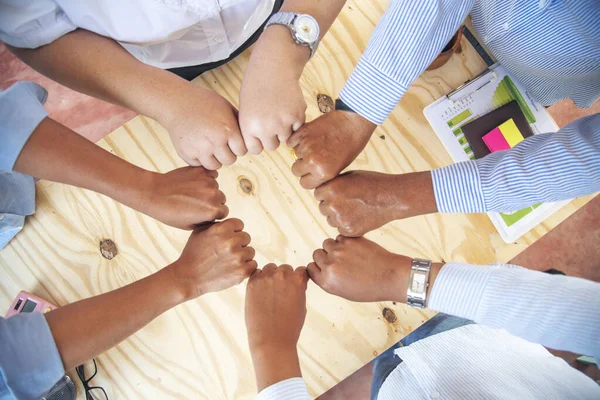 Diverse multiethnic Partners hands together teamwork group of multiracial people meeting join hands togetherness. Diversity people hands join empower partnership teams connection volunteer community