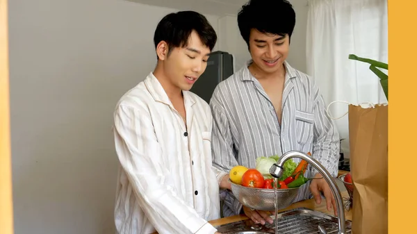 Happy Asian Gay Couple Homosexual Cooking Together Kitchen Wash Vegetable — Stockfoto