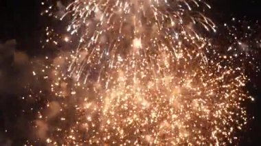 Golden Firework celebrate anniversary happy new year 2023, 4th of july holiday festival. Gold firework in the night time celebrate national holiday. Countdown to new year 2023 gold party time event