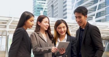 Business Partner using digital tablet online meeting team Partnership businessman, businesswoman talking together. Diversity Asian Business Partner online meeting trust teamwork. Asian Business team