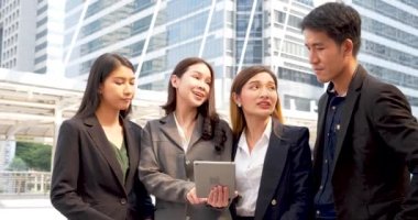 Business Partner using digital tablet online meeting team Partnership businessman, businesswoman talking together. Diversity Asian Business Partner online meeting trust teamwork. Asian Business team