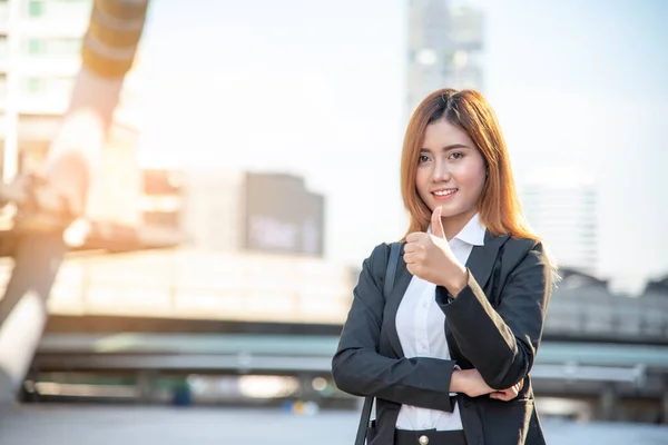 Thumbs up woman\'s hand satisfaction job with positive happy good sign. Close up businesswoman hands Positive idea good business women. Female Gesture sign Thumbs up success executive smiling face