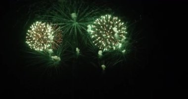 Green Firework celebrate anniversary happy new year 2023, 4th of july holiday festival. Green firework in night time celebrate national holiday. Countdown to new year 2023 festival party time event