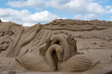Lappeenranta, Finland. August 21, 2022. Swans - sand sculpture in  Finnish nature themed Lappeenranta Sandcastle