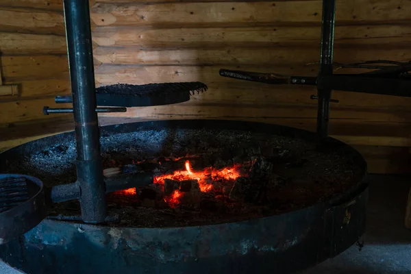 Glowing ember on the middle of the fire pit