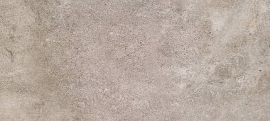 Koyu arkaplan, kırsal doku, gri ve yanmış çimento tonlarıyla.