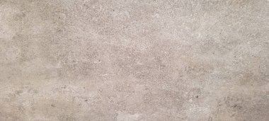 Koyu arkaplan, kırsal doku, gri ve yanmış çimento tonlarıyla.