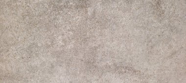 Koyu arkaplan, kırsal doku, gri ve yanmış çimento tonlarıyla.