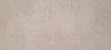 Koyu arkaplan, kırsal doku, gri ve yanmış çimento tonlarıyla.