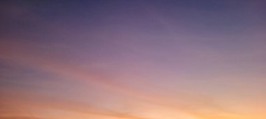 image of colorful sky with dark clouds in late afternoon in Brazil
