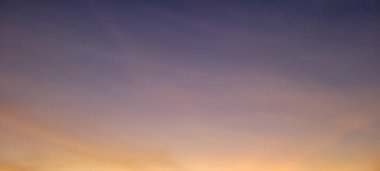 image of colorful sky with dark clouds in late afternoon in Brazil