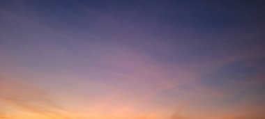 image of colorful sky with dark clouds in late afternoon in Brazil