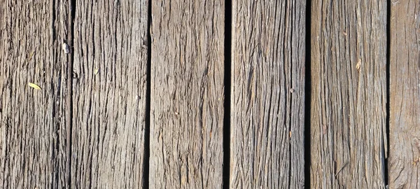 rustik ahşap arka plan açık renk ve koyu damarlar panel olarak kullanılıyor