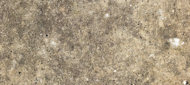 asfalt çimento ve yanmış taşların rustik dokusuna sahip koyu arkaplan