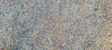 asfalt çimento ve yanmış taşların rustik dokusuna sahip koyu arkaplan