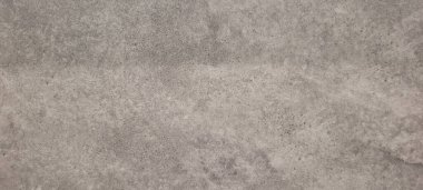 Soyut gri yanmış çimento döşeme desenli koyu renk arka plan panel üzerinde