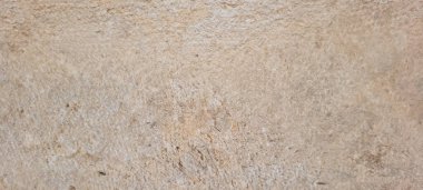 Soyut gri yanmış çimento döşeme desenli koyu renk arka plan panel üzerinde