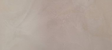 Soyut gri yanmış çimento döşeme desenli koyu renk arka plan panel üzerinde