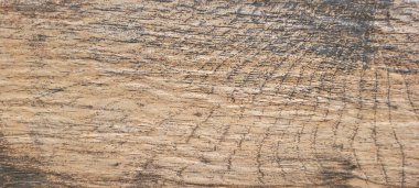 Soyut panelde koyu damarları olan rustik ahşap arkaplanı aydınlat